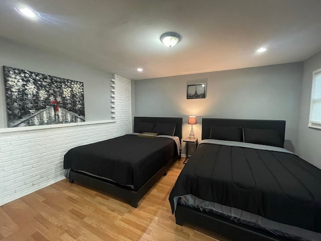 bedroom with light hardwood / wood-style floors