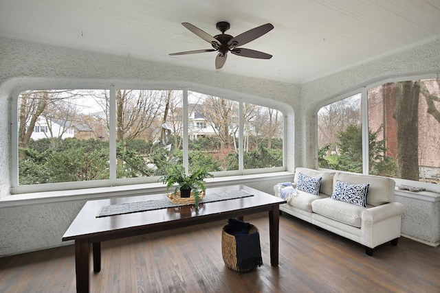 sunroom with ceiling fan