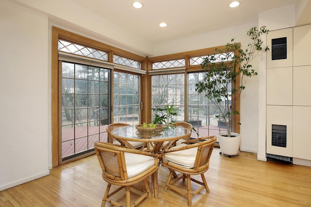 dining room with light wood-type flooring