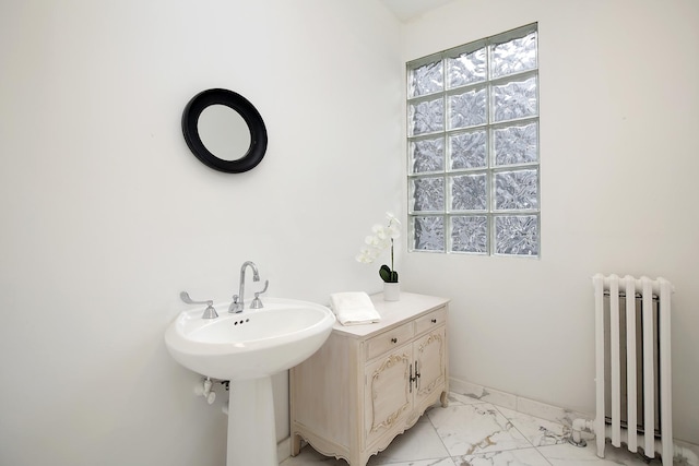 bathroom featuring radiator heating unit