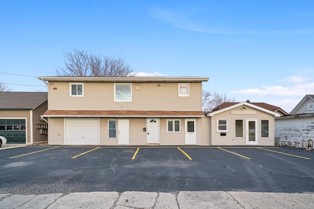 exterior space with a garage