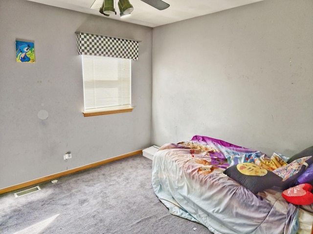 bedroom featuring a ceiling fan, carpet, visible vents, and baseboards