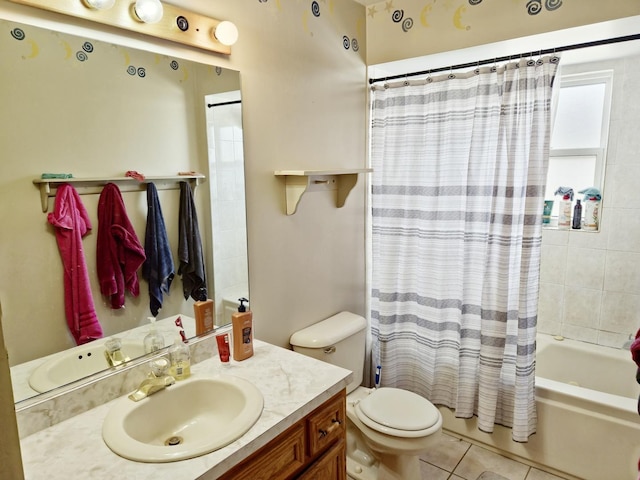 full bathroom with shower / tub combo, toilet, vanity, and tile patterned flooring