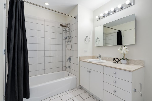 bathroom with shower / bath combination with curtain, vanity, and tile patterned floors