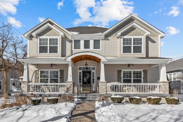 craftsman inspired home featuring a porch and a ceiling fan