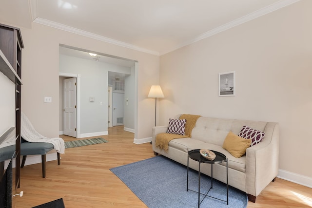 5331 S Harper Ave Unit 1, Chicago, IL 60615 - living area featuring light wood-type flooring, crown molding, and baseboards