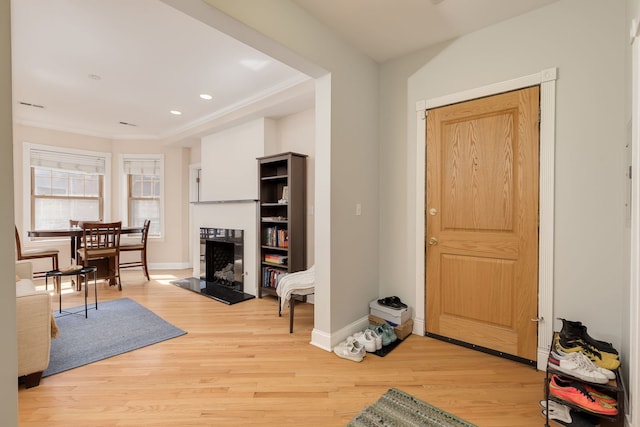 5331 S Harper Ave Unit 1, Chicago, IL 60615 - foyer with recessed lighting, light wood-style flooring, baseboards, and ornamental molding