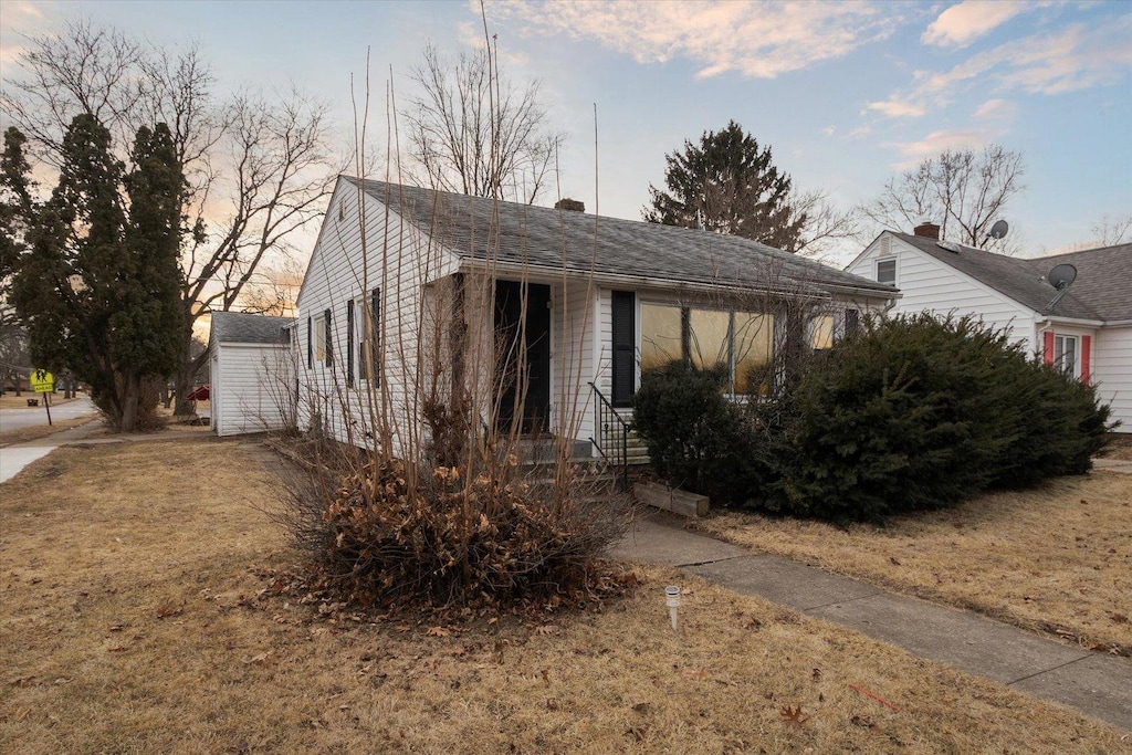 view of front of house with a lawn