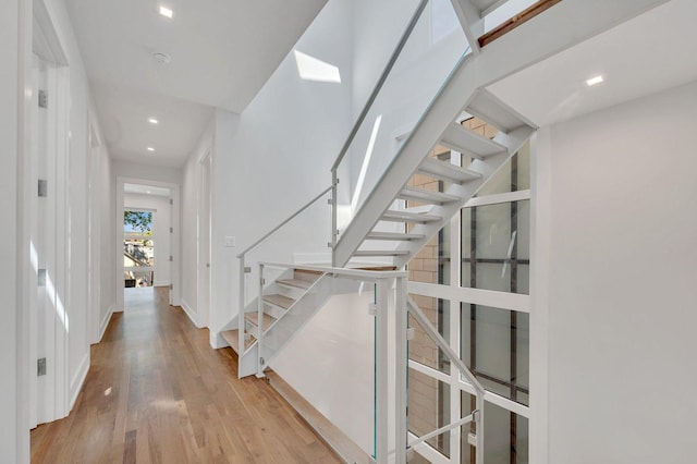 foyer entrance with light hardwood / wood-style floors