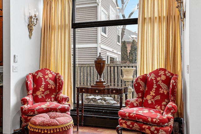 sitting room with hardwood / wood-style floors