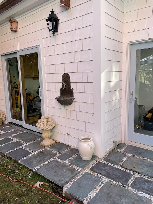 doorway to property with a patio area