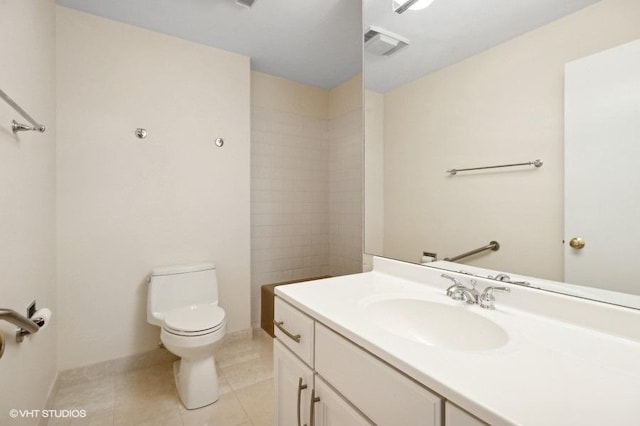 full bath with vanity, baseboards, visible vents, tile patterned flooring, and toilet