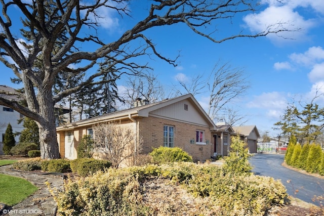 view of side of property featuring a garage