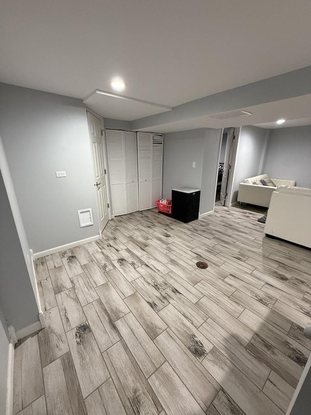 basement with light wood-type flooring