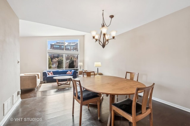 dining room featuring an inviting chandelier