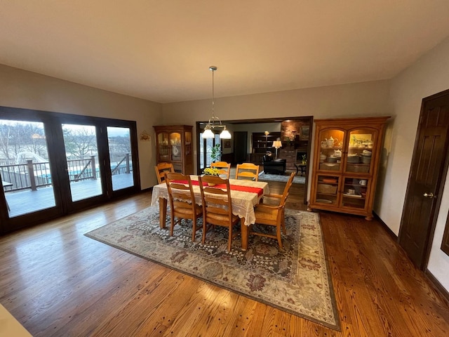 dining area featuring dark hardwood / wood-style flooring