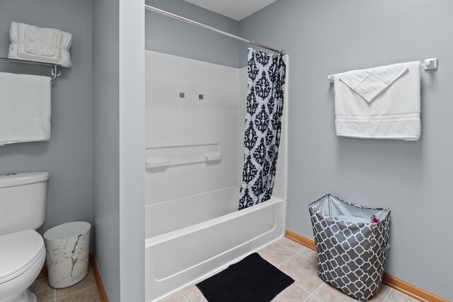 1711 Fallbrook Dr, Hampshire, IL 60140 - full bath with toilet, shower / bath combo, tile patterned floors, and baseboards