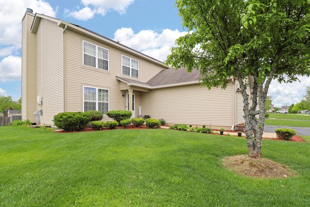 1711 Fallbrook Dr, Hampshire, IL 60140 - view of front of property featuring a front lawn, crawl space, and a chimney