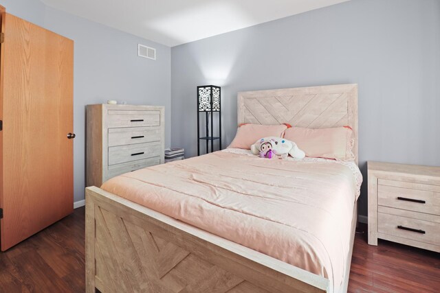 1711 Fallbrook Dr, Hampshire, IL 60140 - bedroom with dark wood-style flooring