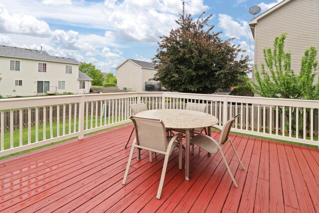 1711 Fallbrook Dr, Hampshire, IL 60140 - deck featuring outdoor dining area, a fenced backyard, and a residential view