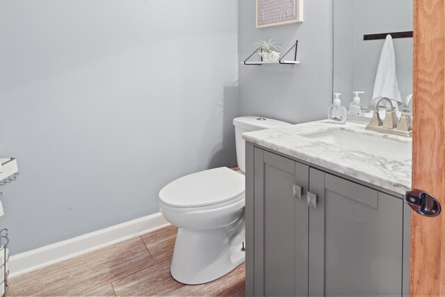 1711 Fallbrook Dr, Hampshire, IL 60140 - bathroom with vanity, toilet, and baseboards