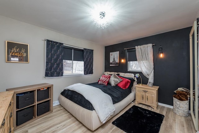 bedroom featuring light wood-type flooring