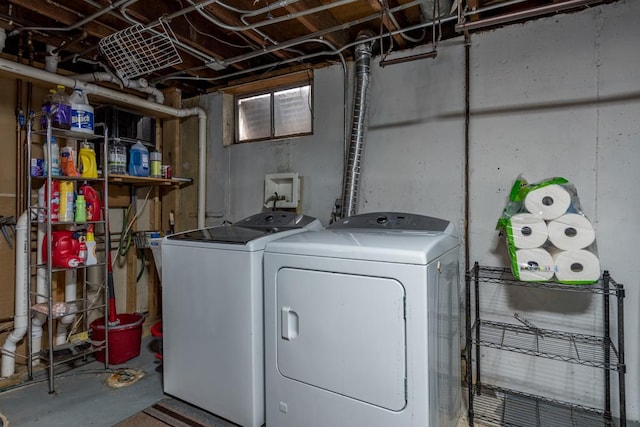 washroom with separate washer and dryer