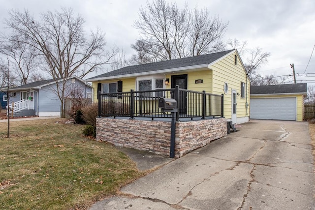 view of front of home with a wooden deck, a garage, and a front yard