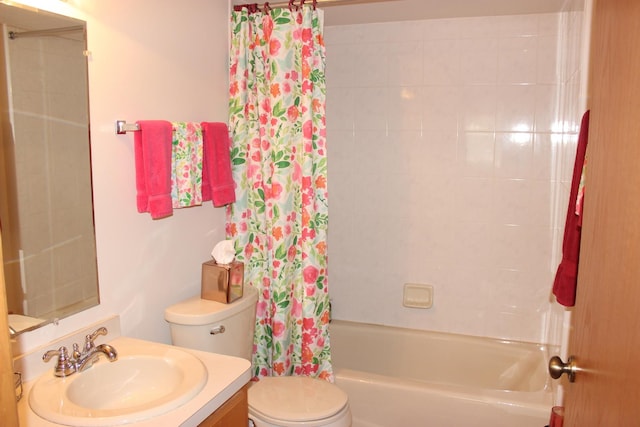 full bathroom featuring vanity, shower / bathtub combination with curtain, and toilet