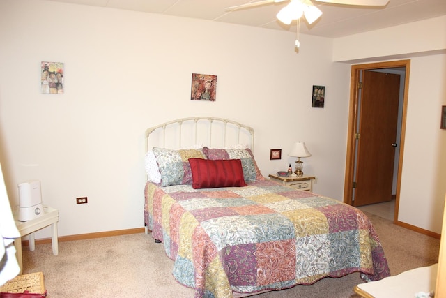 bedroom with light colored carpet and ceiling fan