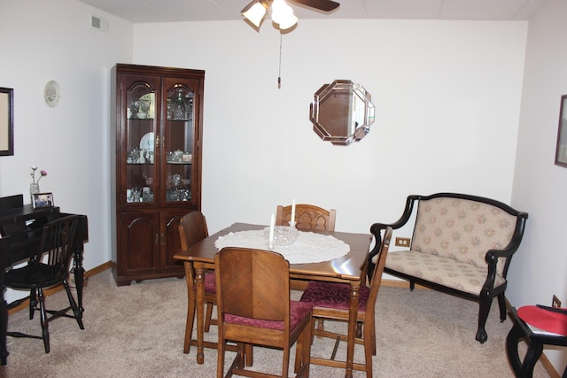 view of carpeted dining space