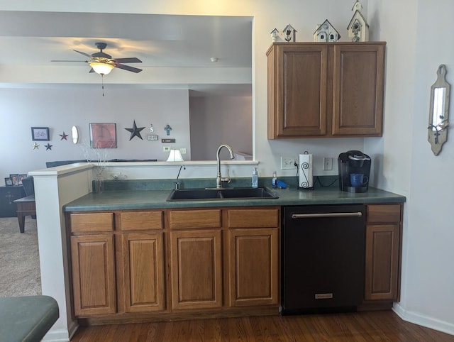 kitchen featuring dark hardwood / wood-style floors, dishwasher, sink, and ceiling fan