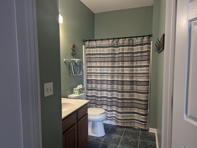 bathroom featuring a shower with curtain, tile patterned floors, vanity, and toilet