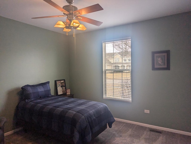 bedroom featuring ceiling fan and carpet floors