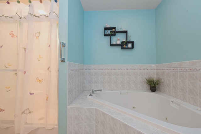 bathroom with tiled bath