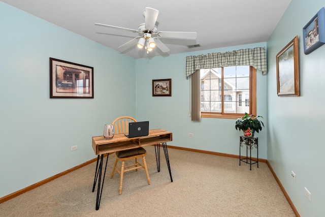 office with ceiling fan and light colored carpet