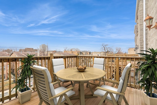 balcony featuring outdoor dining area