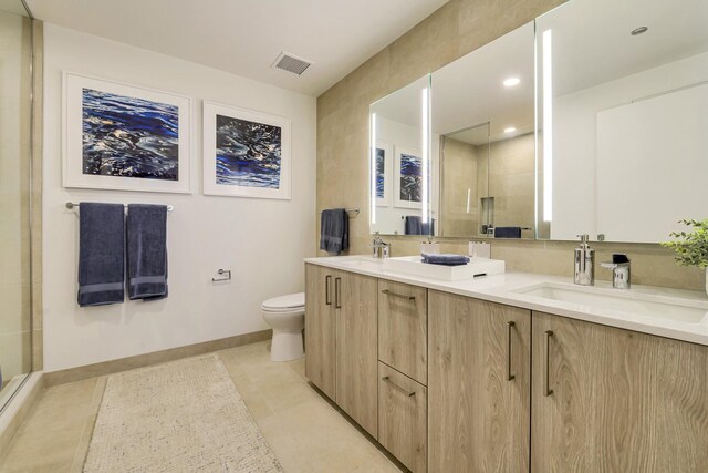 211 N Harbor Dr Unit 1909, Chicago, IL 60601 - bathroom with tile patterned floors, vanity, toilet, and a shower with door