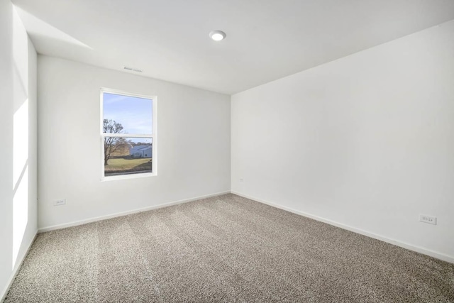 view of carpeted spare room