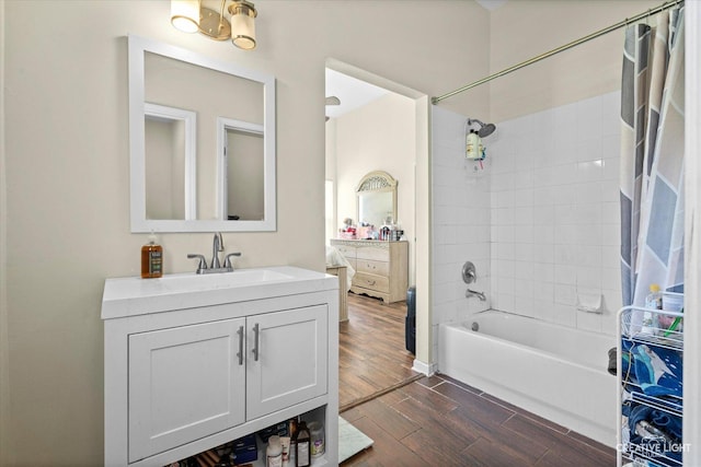 373 Wagonwood Rd, Round Lake, IL 60073 - full bath featuring vanity, shower / bathtub combination with curtain, and wood finished floors