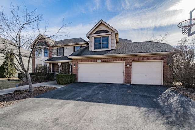 view of front of property with a garage