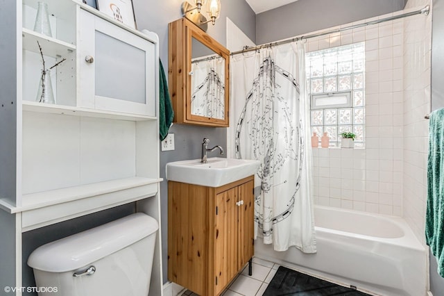 bathroom featuring tile patterned flooring, shower / bathtub combination with curtain, toilet, and vanity