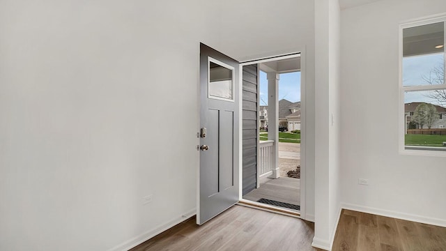 entrance foyer featuring light hardwood / wood-style floors