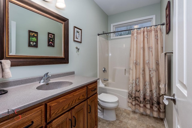 full bathroom featuring shower / bathtub combination with curtain, vanity, and toilet