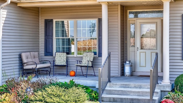 entrance to property featuring covered porch