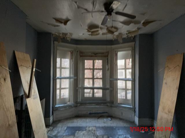 miscellaneous room featuring ceiling fan