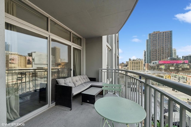 balcony featuring an outdoor living space