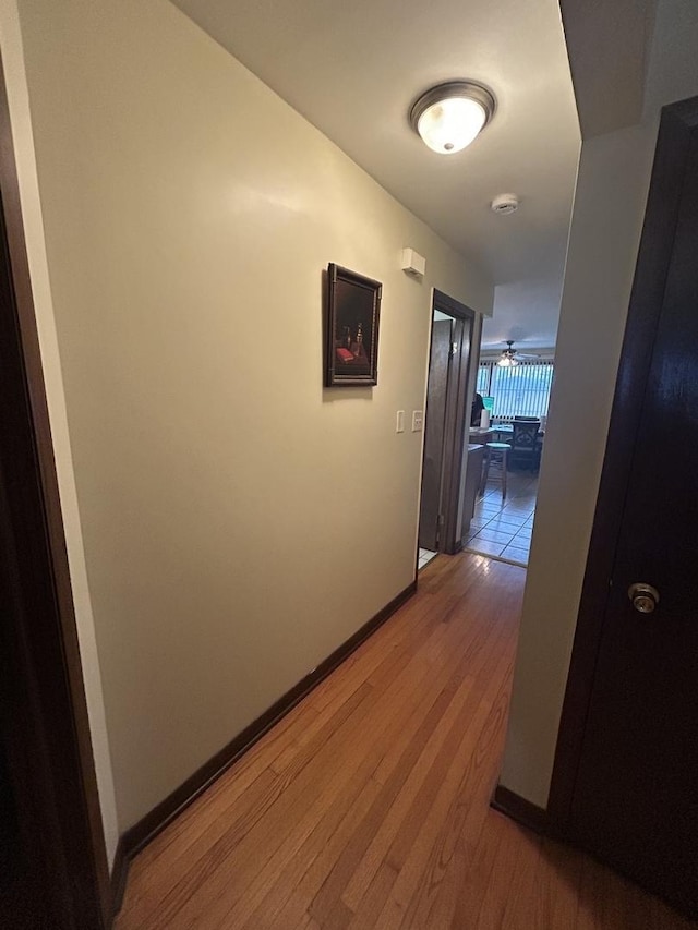 hallway featuring light hardwood / wood-style flooring