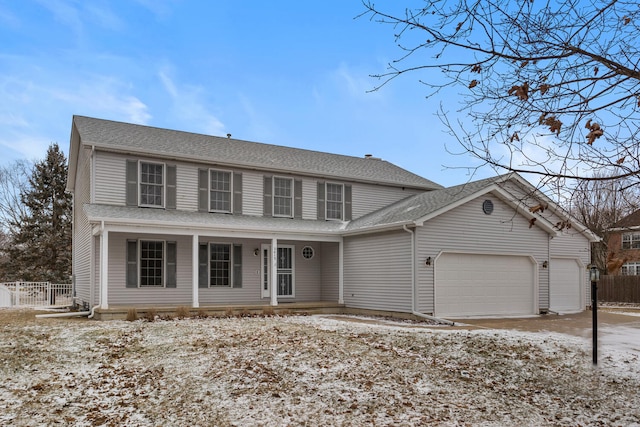 view of front of house with a porch, an attached garage, fence, and a shingled roof