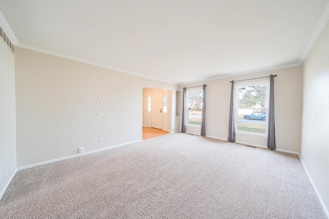 carpeted empty room with crown molding